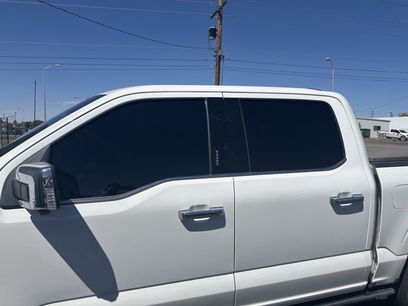 Tinted white Ford F-150 truck